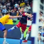 Rukometaš puca na gol (flopping u rukometu)